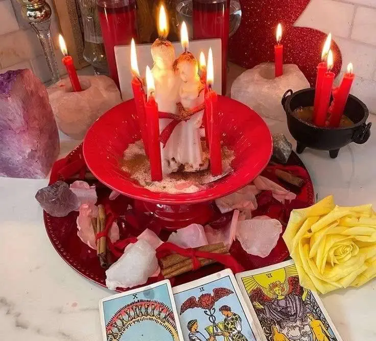 Attract New Love and Your Soulmate in USA - Red candles in a bowl with rose petals and tarot cards