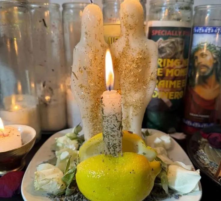 Genuine Love Spells in 24 Hours in USA - White couple candles on a lemon and herb plate