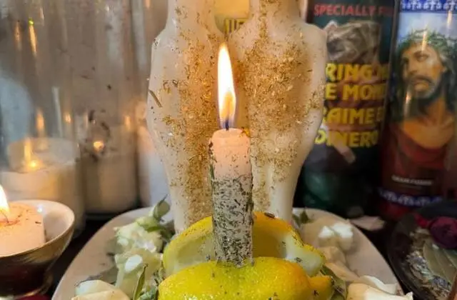 Genuine Love Spells in 24 Hours in USA - White couple candles on a lemon and herb plate