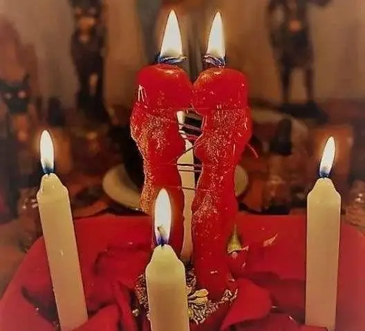 Love Spells That Work Immediately in USA - Red couple candles burning between white candles