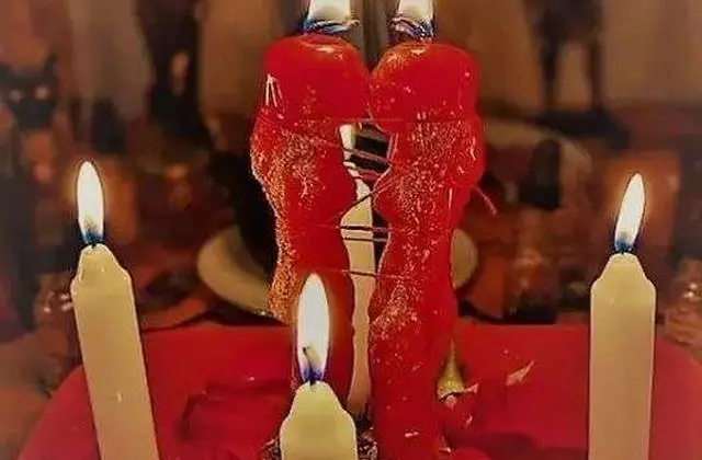Love Spells That Work Immediately in USA - Red couple candles burning between white candles